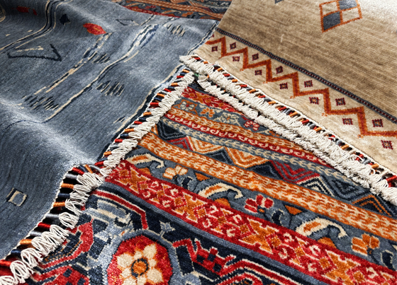 Zara: The labor intensive rug weaved on special looms with tencel and put through hand made rug processes subsequent to weaving - inspired and created from traditional rug making skills of women from Ushak region - increased durability with exclusive dying process